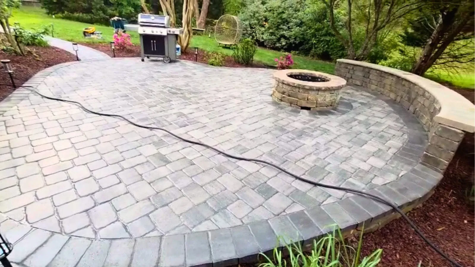 Fire Pit Installation project by Sam General Landscaping
