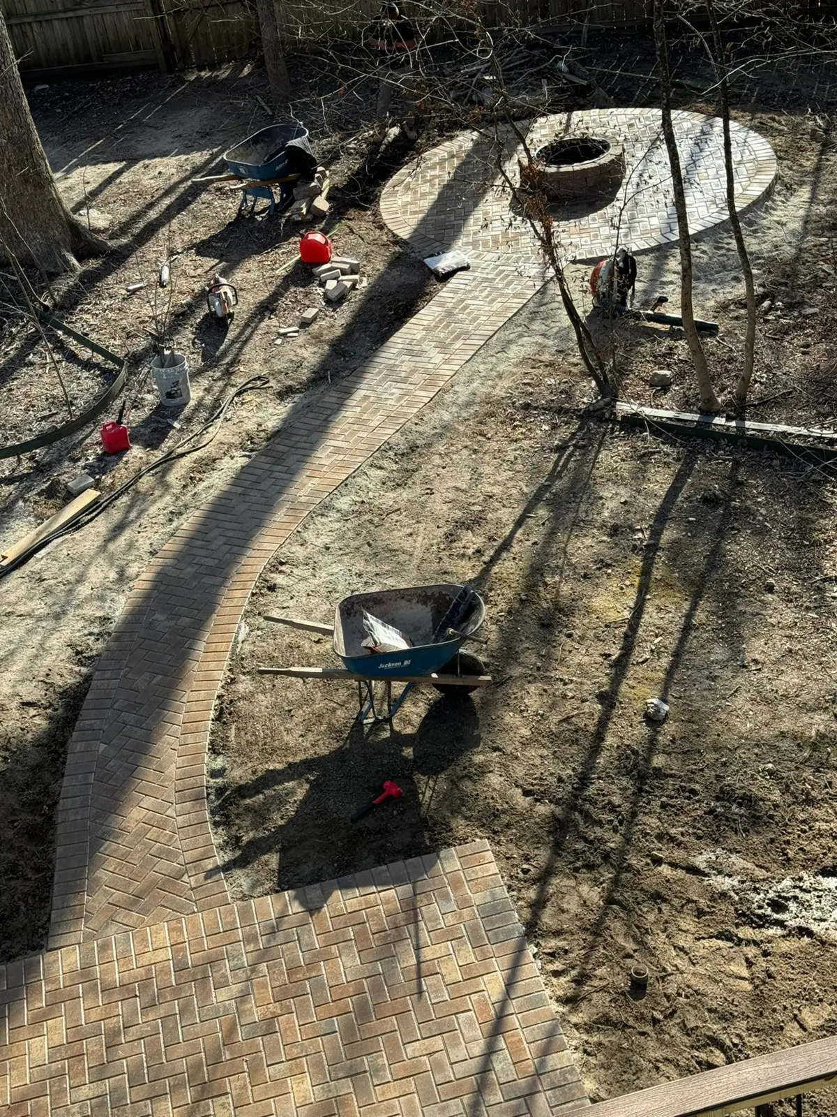 Fire Pit Installation project by Sam General Landscaping