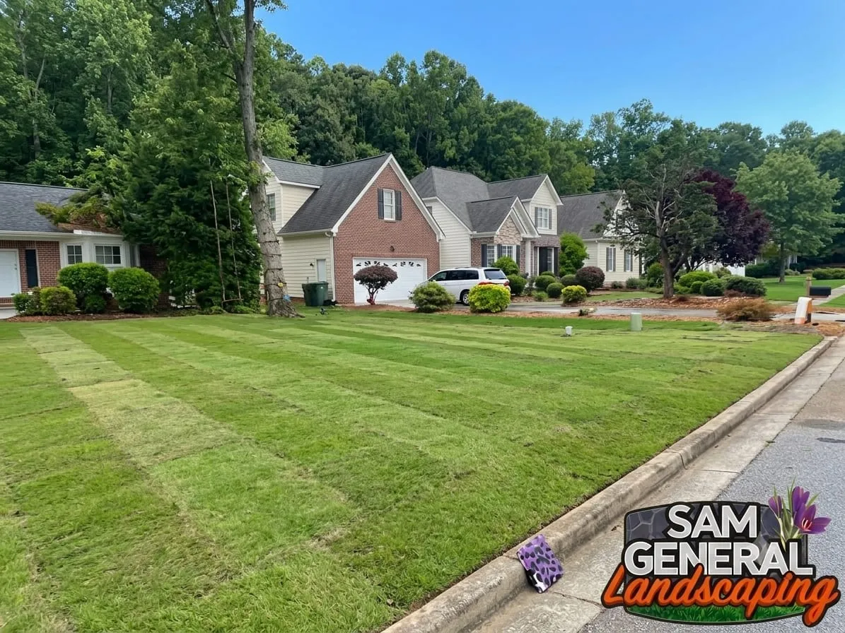 Professional sod installation with mulch beds